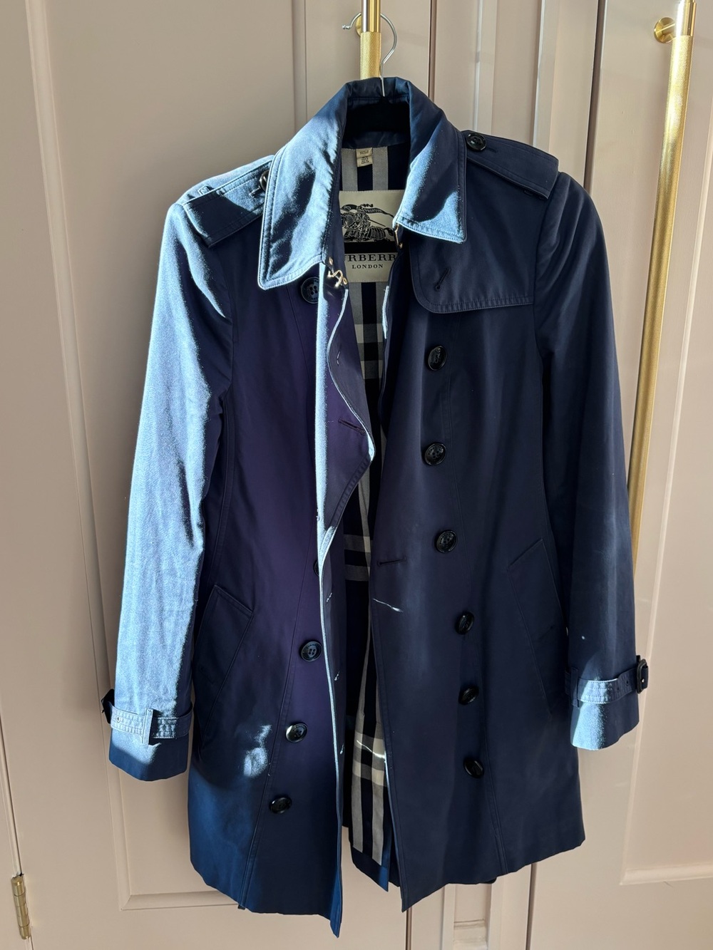 Woman’s Navy Blue Burberry Trench Coat